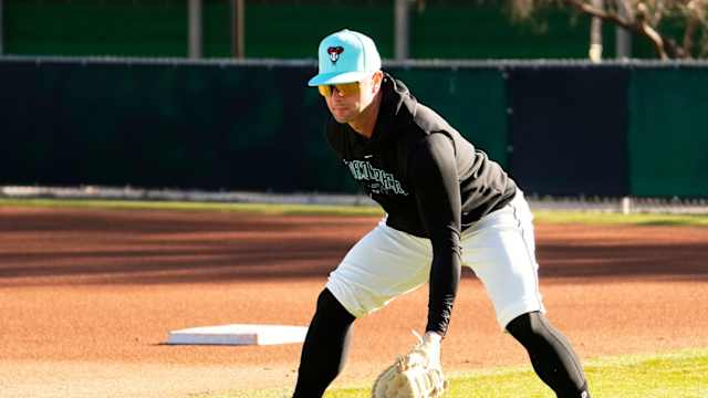 Christian Walker fielding baseballs at Spring Training Practice